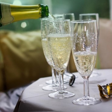 Champagne being poured into glasses